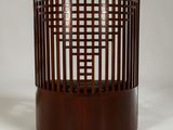 an image of a round wooden table with a glass top
