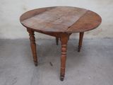 a wooden table that has been turned into a dining table
