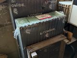 two boxes stacked on top of each other in a room