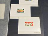 a picture of a collection of stamps on a table