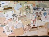a suitcase full of old postcards and other papers