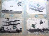 un vieux livre avec des images d'avions et des timbres dessus
