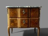 an image of a wooden chest of drawers with marble top