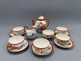 une image représentant un service à thé composé de six tasses et soucoupes
