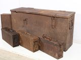 three old suitcases sitting on a shelf next to each other