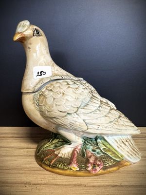 a bird that is sitting on top of a table