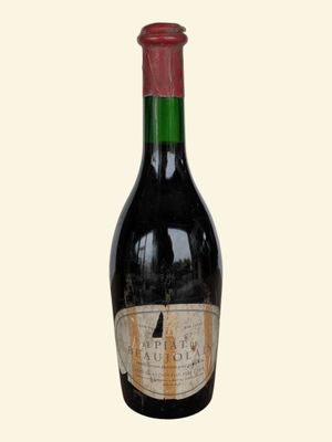 a bottle of wine that is sitting on a table