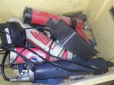 a lot of tools that are in a bin together