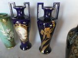 three vases sitting next to each other on a table