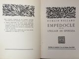 an open book with a picture of a plant on it