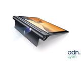 a close up of a tablet with a projector on top of it