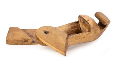 an old wooden plane with a heart shaped handle on a white background
