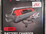 a close up of a box with a battery charger on it