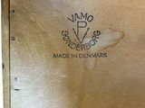 a wooden box with a logo on it that says made in denmark