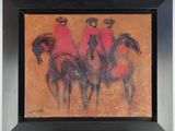 tableau représentant trois hommes à cheval, dans un cadre noir, posé sur une table