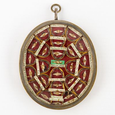 a picture of a red and gold clock with words on it
