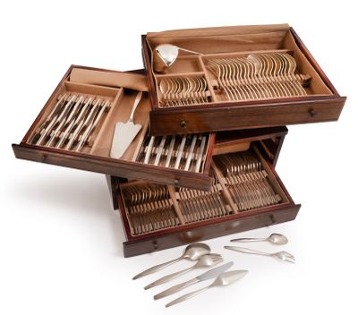 a wooden box with silverware in it on a white surface
