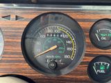 a close up of a speedometer on the dashboard of a car