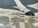 a painting of a man riding a horse on the beach