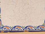 a picture of a blue and white plate with a design on it