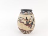 a vase with a picture of a man and a woman on it