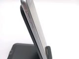 a close up of a cell phone on a stand