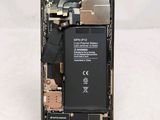 an image of a close up of a cell phone with a broken battery