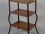 an image of a three tiered table with a tray on top of it