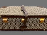 brown and white wicker picnic basket with leather handles