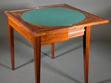 an image of a wooden table with a green top and a drawer