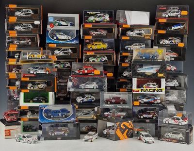 a lot of toy cars that are stacked up together