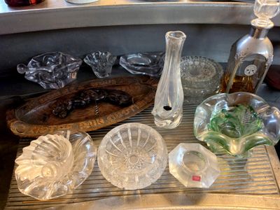many glass items on the counter in the kitchen