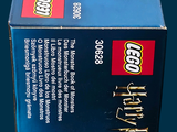 a box of lego harry potter ' s chocolate cake on a table