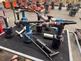 many tools that are sitting on a table in a warehouse