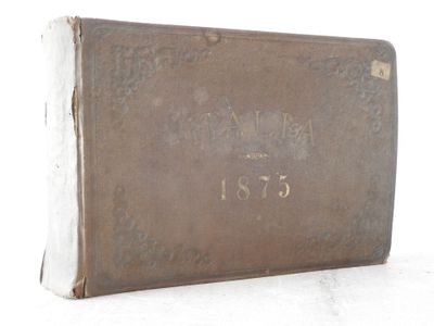 an old book that is sitting on a table