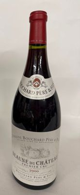 a bottle of wine that is sitting on a table
