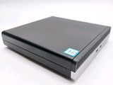 a close up of a black laptop computer sitting on a white surface