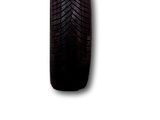 a close up of a car tire on a white background