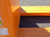 a close up of a forklift on the ground