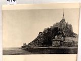 black and white photograph of an old photo of a castle on top of a hill