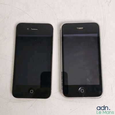 two iphones sitting next to each other on a table