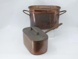 pots and pans are sitting on a white surface with a white background