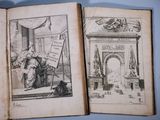 an open book with a drawing of a man and a woman in a room