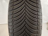 a close up of a tire on a white surface