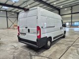 a white van that is parked in a building