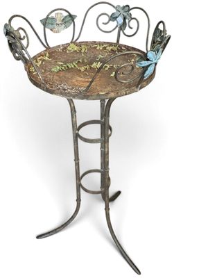 an image of a birdbath sitting on top of a metal stand