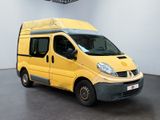 the yellow van is parked in a white room with a black floor