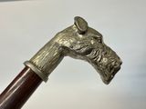 an image of a close up of a walking stick with a horse head on it