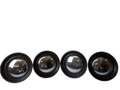 four black lens lenses are lined up in a row on a white background