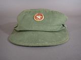 green military cap with a star on the front and a red star on the back